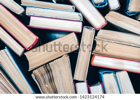 Stack of old book education concept background, many books piles with copy space for text