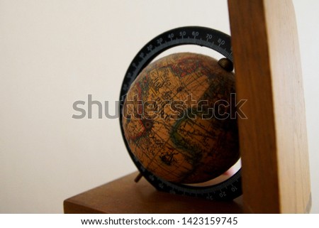 Old-fashioned wooden globe of the Earth