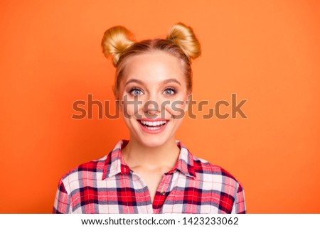 Portrait of charming lovely millennial toothy smile have hairdo hairstyle look spring dressed checked plaid clothing isolated orange background