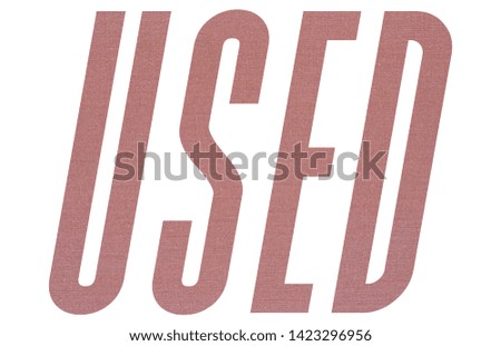 USED word with terracotta colored fabric texture on white background