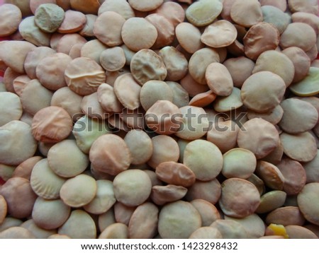 green and brown lentils texture background graphic