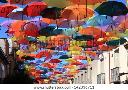 Street decorated with colored umbrellas.Madrid,Getafe, Spain Royalty-Free Stock Photo #142336711