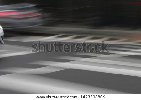 Fast car driving in a road