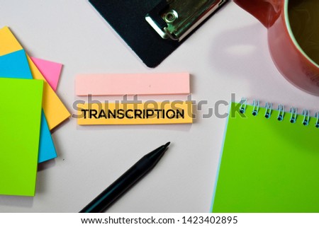 Transcription text on sticky notes with office desk concept Royalty-Free Stock Photo #1423402895