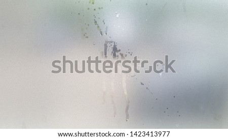 a surface with water on it dripping from glass for use as a background