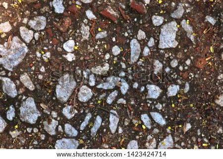 Close up surface of gravel ground textures in high resolution