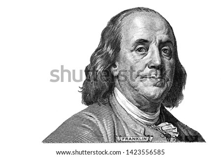 Benjamin Franklin cut on new 100 dollars banknote isolated on white background Royalty-Free Stock Photo #1423556585
