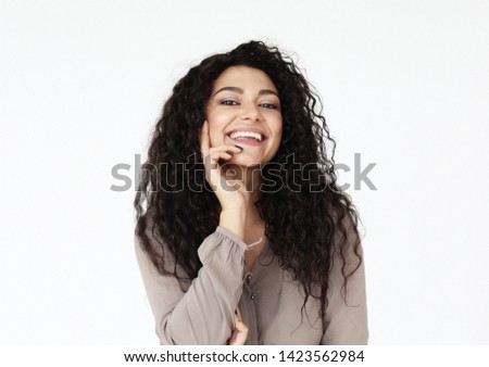 lifestyle, emotion and people concept - young smiling african woman wearing casual over white background