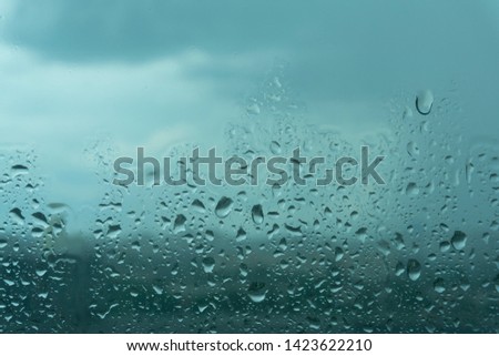 Water drops background. Water droplets on the glass after heavy rain. Simple pattern for advertising and websites.  abstract texture with aqua. 