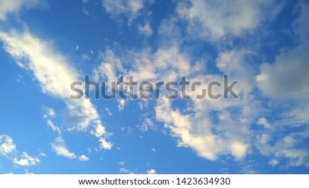 photo colored cloudy blue sky