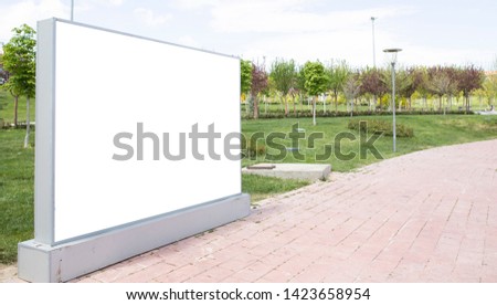 Horizontal blank billboard on the wall. 