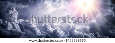 Jesus Christ In The Clouds With Brilliant Light - Ascension / End Of Time Concept Royalty-Free Stock Photo #1423669553