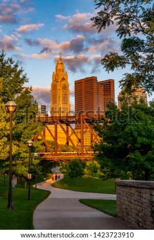 The last night of sunset hitting skyline of columbus as seen from the path of the Scioto Mile. 