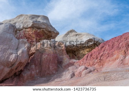 Landscape and close up of large pink, white and orange rock formations at Interpretive Paint Mines in Colorado