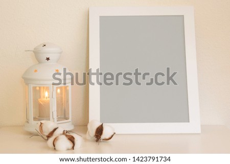 Layout of the frame in gray neutral color for design or inscription on a light background with a scroll and a cotton button.Mockup.