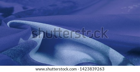 Texture, background, pattern, postcard, silk fabric, female color scarf with blue white flowers. The gorgeous design is based on attractive background images. You will be the best