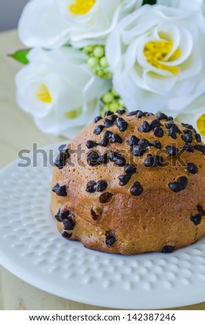 Bread with chocolate chip on white dish