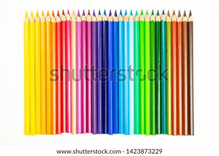 Abstract background from color pencils. Line of colored pencils. Education frame concept.