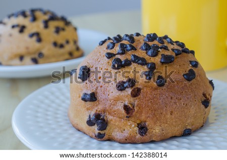 Bread with chocolate chip on white dish