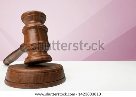 Wooden gavel on table close up. Justice concept
