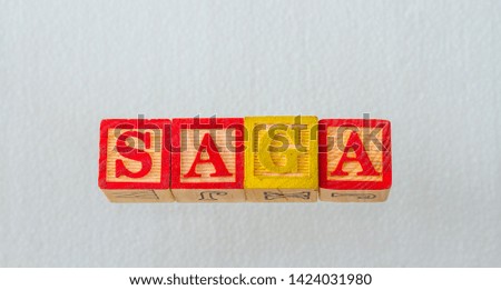 The term saga visually displayed on a clear background using colorful wooden blocks image in landscape format