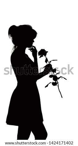silhouette of a young elegant woman in a dress and with a rose in hands, figure of slim beautiful girl with a flower on a white isolated background