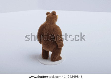 toy brown bear on white background
