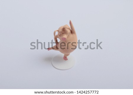 toy pink pig on white background
