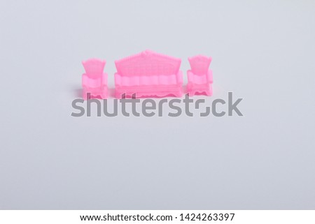 a set of toy furniture on a white background

