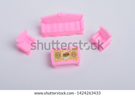 a set of toy furniture on a white background
