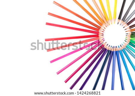 Colored wooden pencils with tip on white background