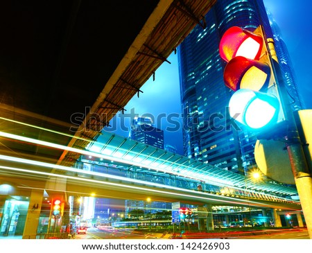 Traffic light in the city Royalty-Free Stock Photo #142426903