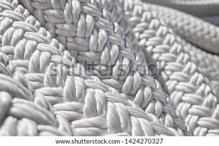 Close up picture of a thick sailing ship rope, selective focus.