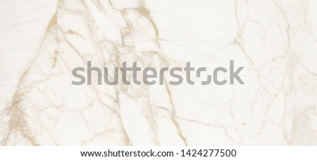 Golden Calacatta marble texture of a natural white and grey stone tile Royalty-Free Stock Photo #1424277500