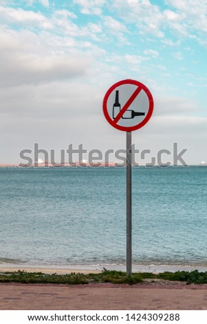 Sign by seaside prohibiting the use of alcohol