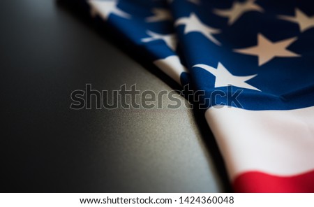 United states of america flag close up in dark background with copy space