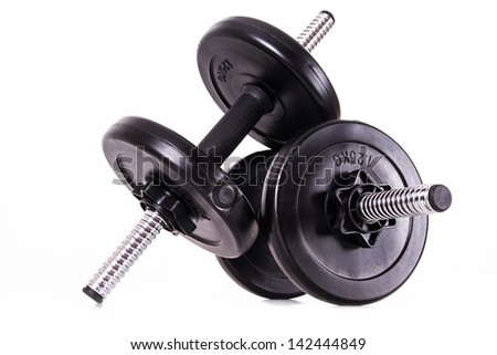 Black gym barbell, dumbbell with disks, isolated on white background.