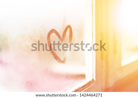 Hearts drawn on a misted window. Romantic background. Love store 