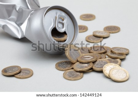 Crushed Aluminum Can with coins