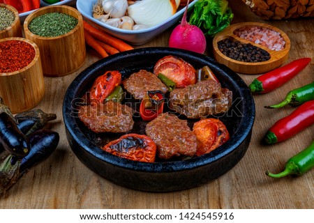 Meat Saute Turkish Et sote with wooden table - Hair Pie Meat - Sac Tava - Sac Kavurma
