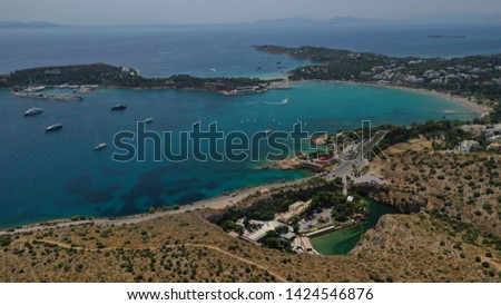 Aerial view of iconic lake Vouliagmeni famous for healing abilities, Athens riviera, Attica, Greece