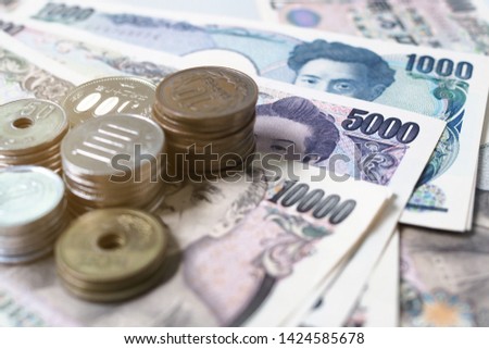 Japanese yen notes and Japanese yen coins for money concept background   