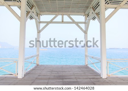The wooden terrace beside the beach with clearsea