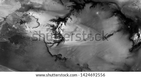 black beach, black gold, polluted desert sand, black and white photo, abstract photography of the deserts of Africa from the air, aerial view, abstract naturalism, contemporary photo art,