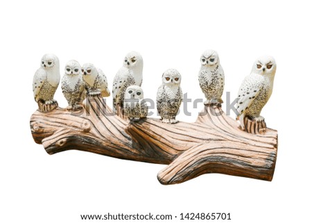 Family statue of the owl on a white background