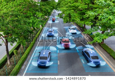 Smart cars with automatic sensor driving on green road with wireless connection
