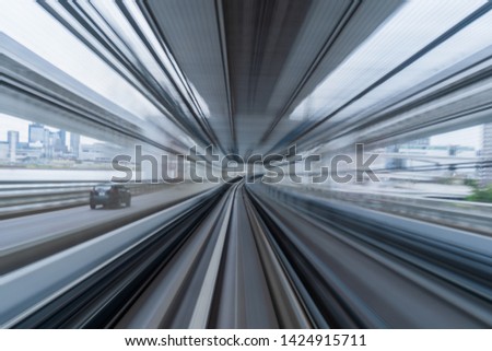 moving motion blur of train running on tunnel in Tokyo, Japan