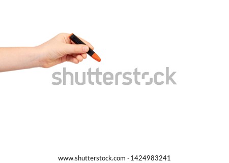 Kid hand holding color pencil, writing and drawing gesture. Isolated on white background. Copy space template