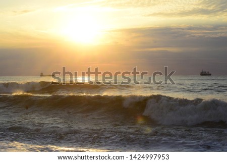 sea coast sunset waves storm