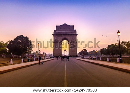 The India Gate (originally called the All India War Memorial) is a war memorial located astride the Rajpath, on the eastern edge of the "ceremonial axis" of New Delhi, India, formerly called Kingsway. Royalty-Free Stock Photo #1424998583